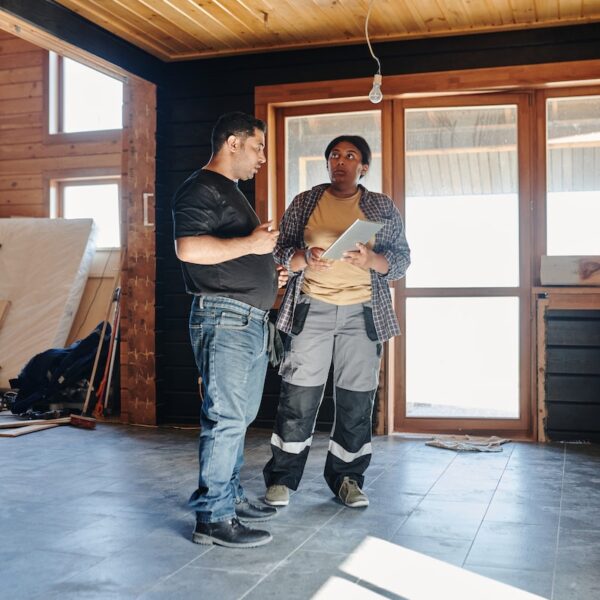 Two People Checking on a Construction Project